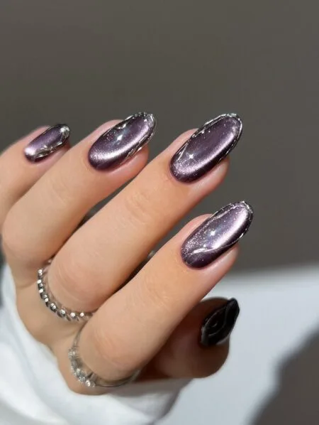 Deep burgundy velvet cat eye nails with a magnetic shimmer.