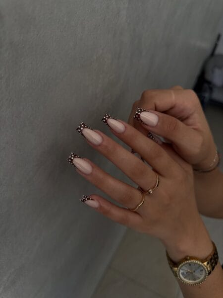 Long coffin nails with chocolate brown polka dot French tips