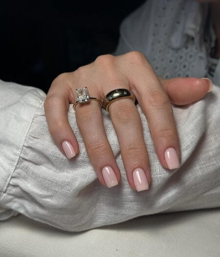 Short square nails in sheer milky rose polish