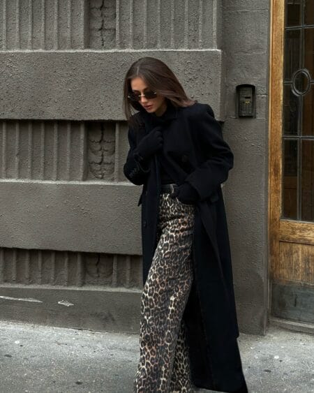 Autumn outfit with black wool maxi coat, roll-neck and leopard-print wide-leg trousers
