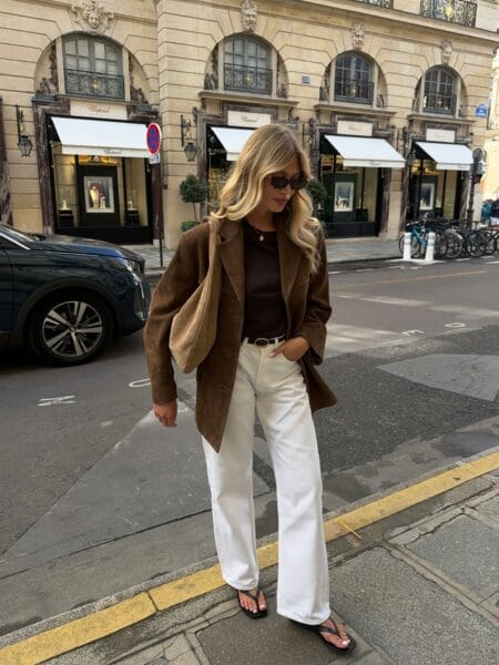 October outfit with brown suede blazer, chocolate tee and white wide-leg jeans