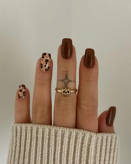 Glossy chocolate brown short square nails with caramel and black leopard print accents