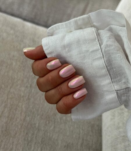 Short square nails in opal chrome shifting between pink, lilac and gold