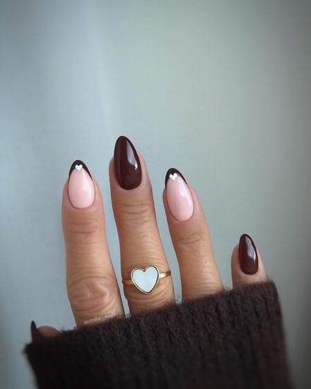 Chocolate French tip nails with delicate white heart details