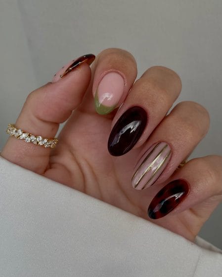 Tortoiseshell and olive green nails with brown, gold, and neutral details